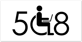 508 logo with stick figure in wheel chair using a laptop