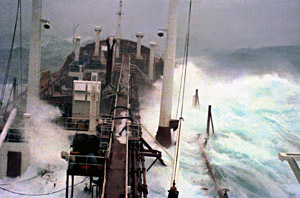 Topping the crest...just to have another huge wave behind it.