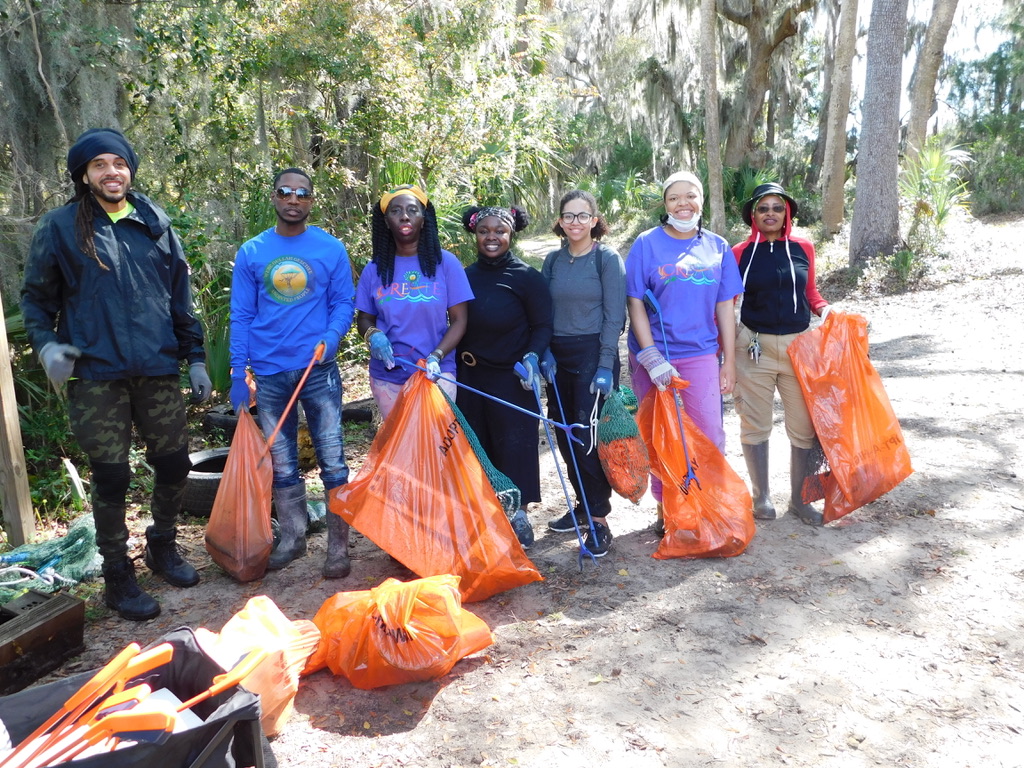 For Gullah/Geechee CREATE Day on July 29, 2023, volunteers clean up marine debris from historic St. Helena Island, South Carolina in the Gullah/Geechee Nation. The marine debris will later be used to create artwork by local Gullah/Geechee artists.