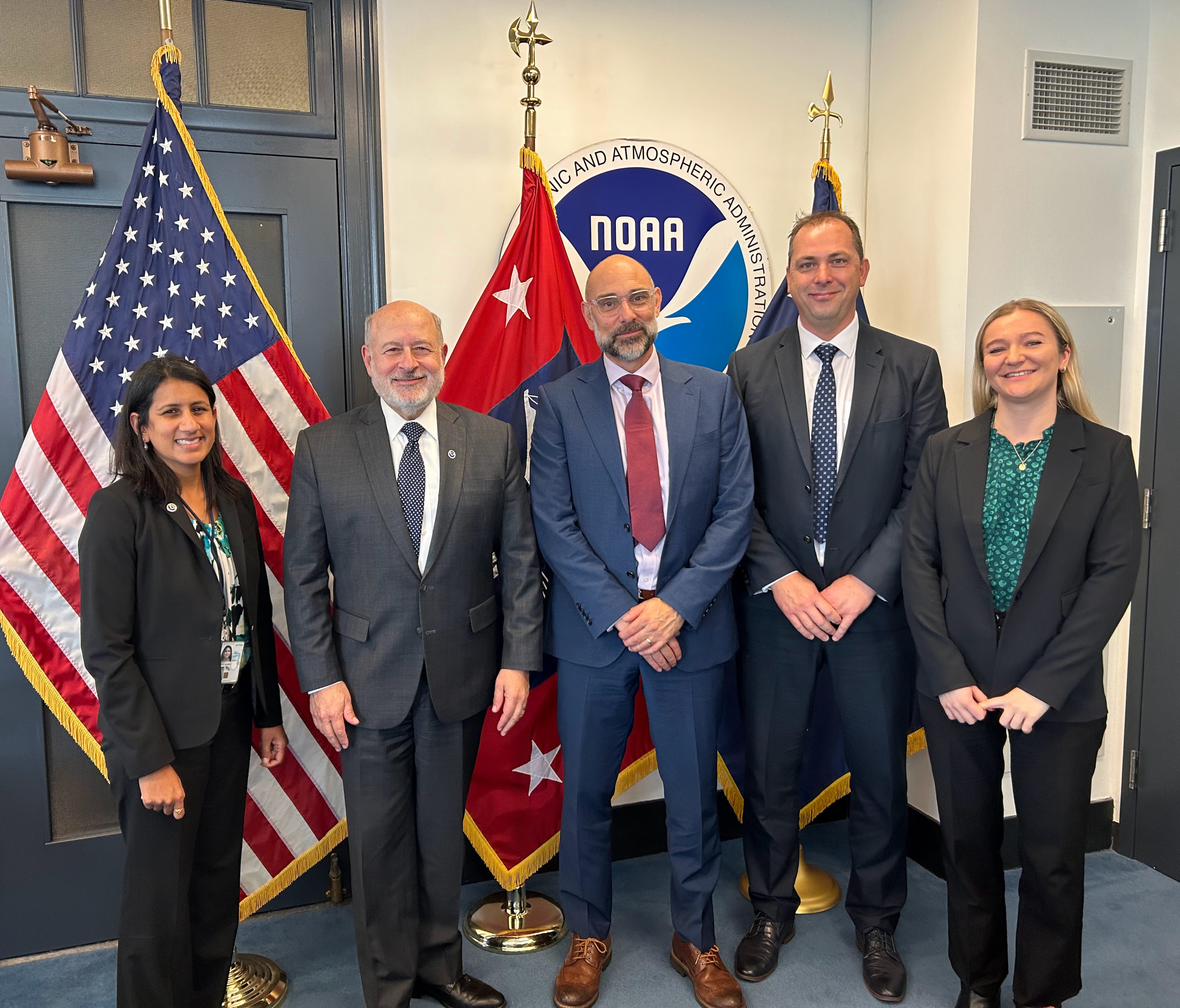 Photo showing the NOAA Administrator Dr. Spinrad and NOAA staff posing with Dr. John Siddorn and staff from the U.K. National Oceanography Centre. 