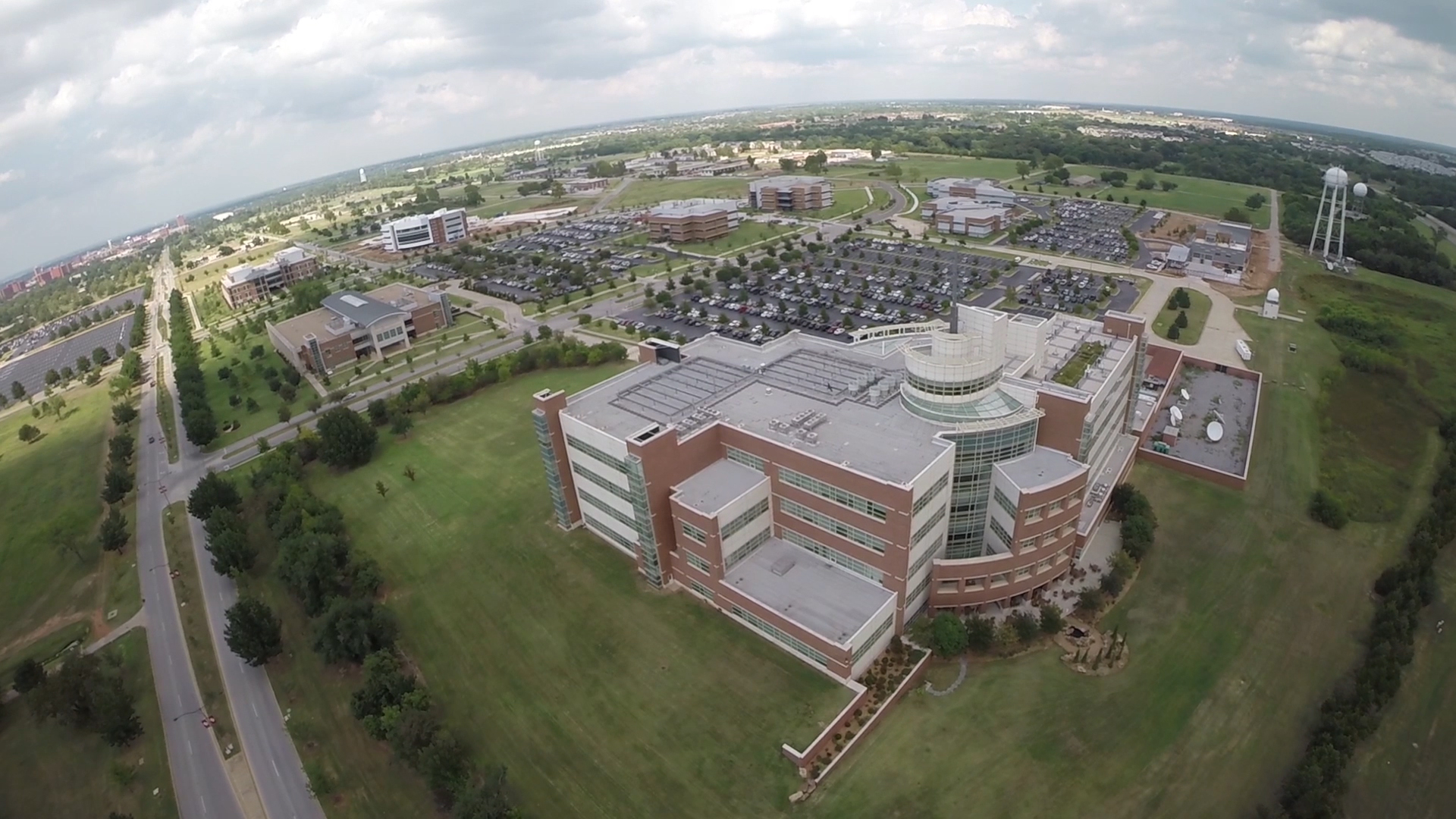 Aerial view of the National weather Center at the Universiy of Oklahoma in Norman, Okla. .... The National Weather Center houses a unique confederation of University of Oklahoma, National Oceanic and Atmospheric Administration and state organizations that work together in partnership to improve understanding of events occurring in Earth’s atmosphere over a wide range of time and space.
