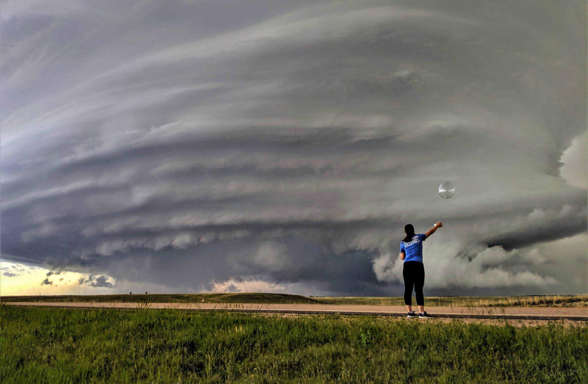 Windsonde launch near Norman, Okla. Windsondes are small weather balloons with attached instrumentation that can be launched every 30–60 seconds from a field vehicle, allowing researchers to have many of them in the air at once.
(Photo by Christiaan Patterson/OU CIMMS/NOAA NSSL)