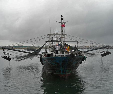 Liberian fishery observers toured a shrimp vessel as part of a two-week observer training program supported by NOAA Fisheries to combat IUU fishing.