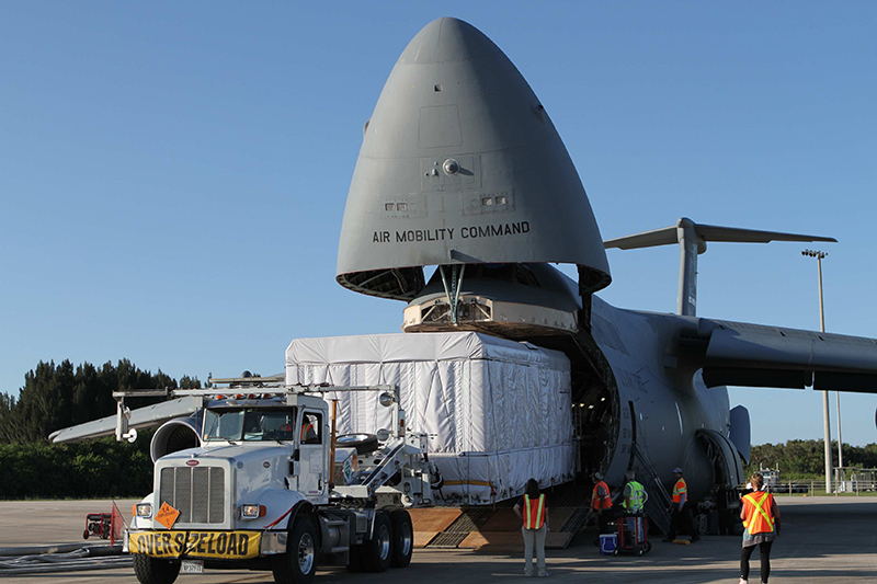 Technicians carefully unload NOAA’s GOES-R, which weighs more than 6,000 pounds – about the same size as a pilot whale. More accurate, faster data and more precise imagery means when a hurricane is bearing down on our coastlines, officials can make better decisions about evacuations.  
