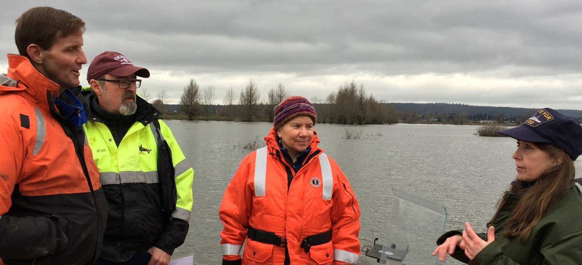 RDML Tim Gallaudet, NOAA Assistant Secretary of Commerce for Oceans and Atmosphere and Deputy NOAA Administrator, visited the Qwuloolt Estuary restoration project in Marysville, Washington to see a NOAA success firsthand. NOAA’s Damage Assessment Remediation and Restoration Program supported the project, which reconnected a former marsh and created more than 350 acres of estuarine marsh, access to stream habitat critical to growing salmon, and community access to local trails. Shown (from left), RDML