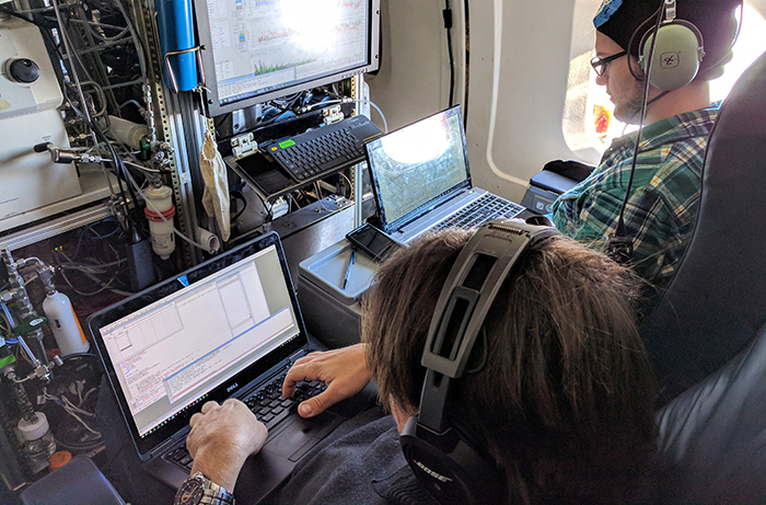 The inside of NASA' DC-8, the world’s largest flying chemistry lab, is crammed with instruments operated by scientists from NOAA and other research institutions. 