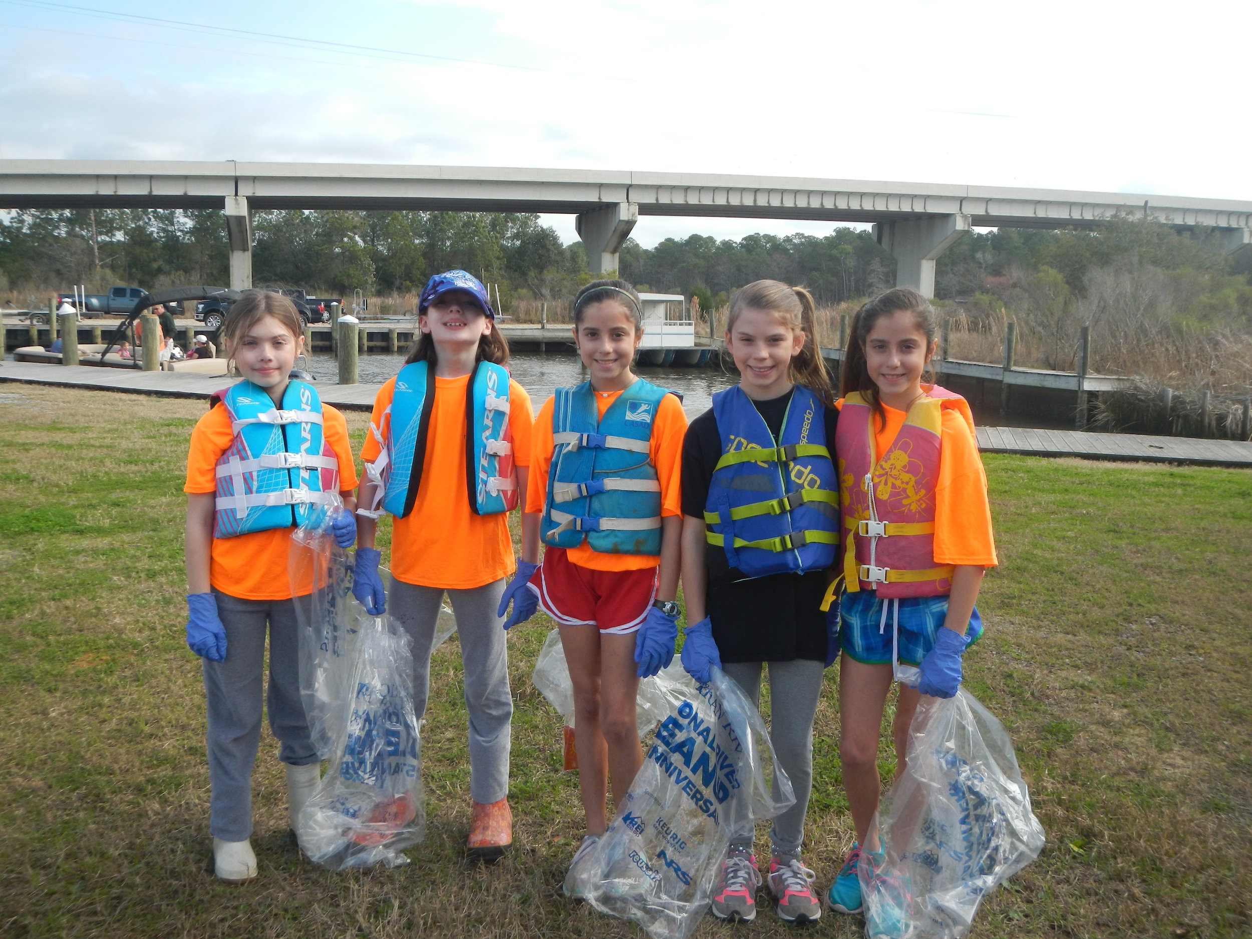 Erosion, sedimentation, and eutrophication from changing weather patterns are significant issues in Weeks Bay National Estuarine Research Reserve in Alabama. Week Bay Foundation Manager and NOAA Planet Steward, Yael Girard, implemented a program, with Planet Stewards Funding, to assess and restore areas of the waterway and to remove trash to combat these issues. 