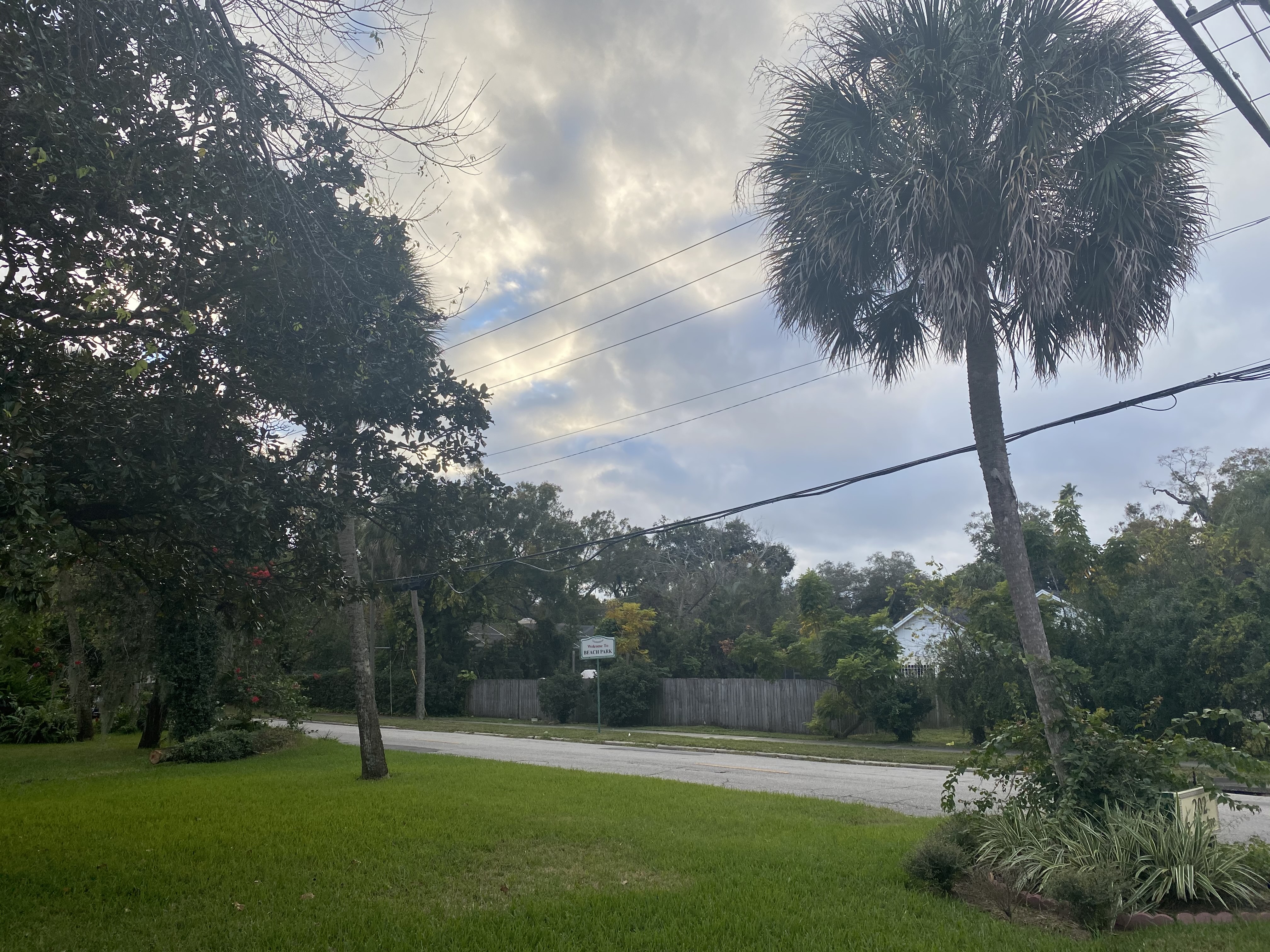 A photo of the location of the sun (behind some clouds!) a few days before the winter solstice at 4:45pm in Tampa, Florida.