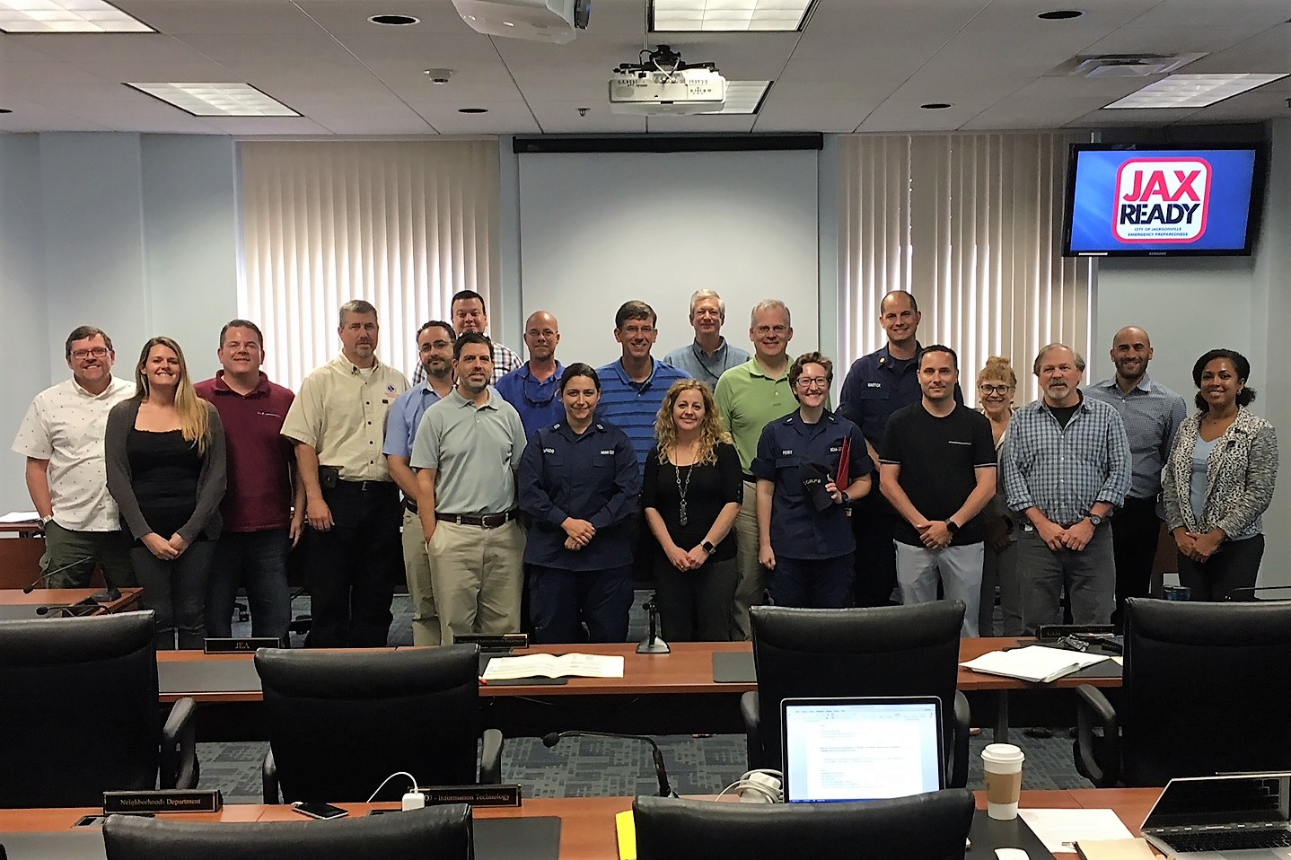 people posing for group photo