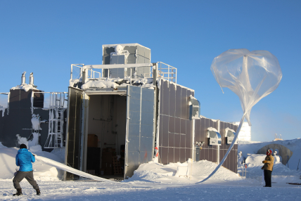 Scientists launch a NOAA ozonesonde, frost point hygrometer, and POPS aerosol particle counter on a balloon to help monitor the Antarctic Ozone Hole on October 5, 2024 at the Amundsen-Scott South Pole Station. Photo credit: William Brotman/United States Antarctic Program.