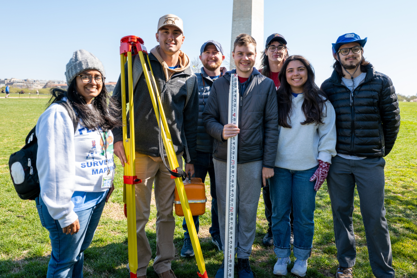 The University of Florida team poses with surveying tools. Pictured (L to R): Karol Hernandez, Gabe Hancock, Justin Thomas (Advisor), Kenneth Dell, Andrea Slaven, Isabel Dupee, Jacob Suarez.