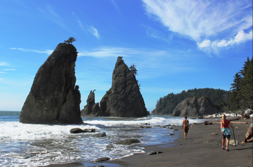Beachgoers enjoy a lovely day hiking along Washington’s Rialto Beach, adjacent to Olympic Coast National Marine Sanctuary.