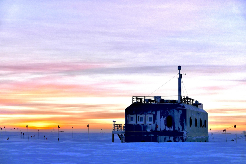 NOAA’s South Pole Atmospheric Research Observatory and a kaleidoscopic sky.