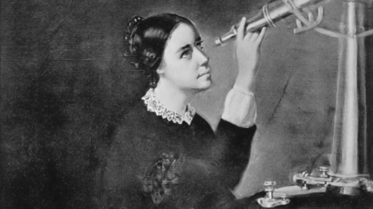 A black and white photo of a portrait in which a young Maria Mitchell peering through a telescope. 1852.