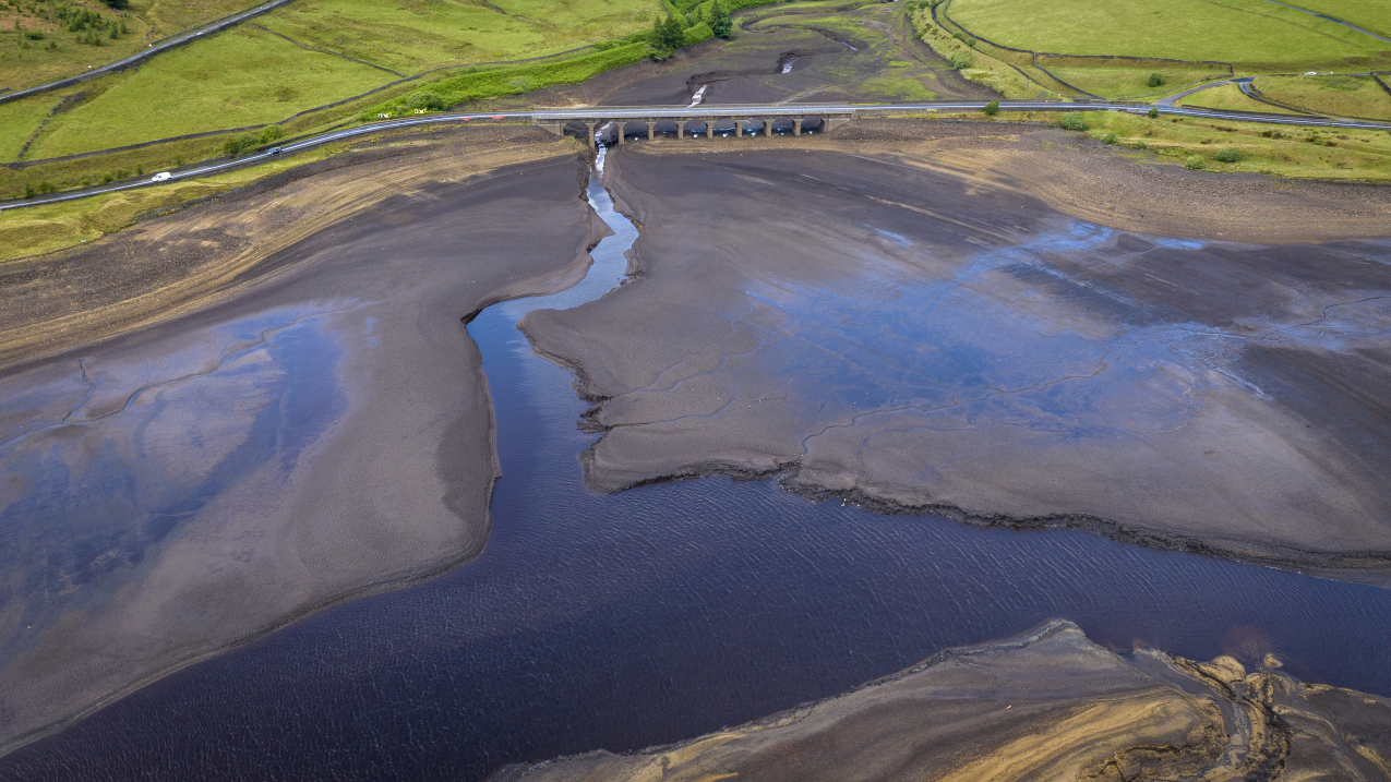 July 3, 2023: An aerial view of low water levels at Woodhead Reservoir in Glossop, England, after the United Kingdom sweltered through its hottest June on record. 2023 was the world’s warmest year on record, beating the next warmest year (2016) by a record-setting margin of 0.27 of a degree F (0.15 of a degree C).