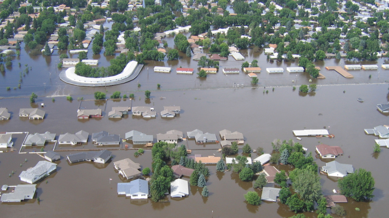 Photo showing the major flooding that occurred in the spring of 2011 near Minot, North Dakota, along the Souris River. Image credit: Courtesy of the North Dakota State Water Commission