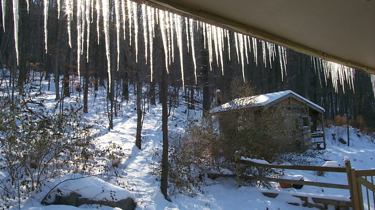 Photo of Icicles on the south side of a home illuminated on a bright winter morning. Harper’s Ferry, WV. Image credit: Janet Ward, NOAA.