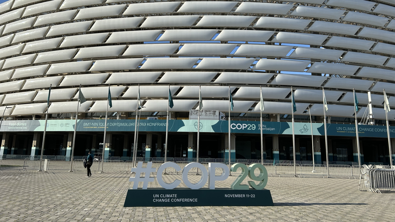 A photo of the venue for the COP29 U.N. climate summit in Baku, Azerbaijan with signage.