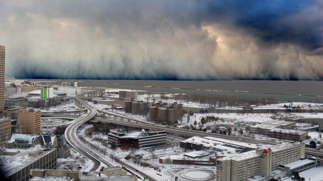 A view from the Buffalo City Town Hall of a wall of intense snowfall descending on the western New York Southtowns. This was the first of two historic back-to-back lake-effect snow events in November 2014. 