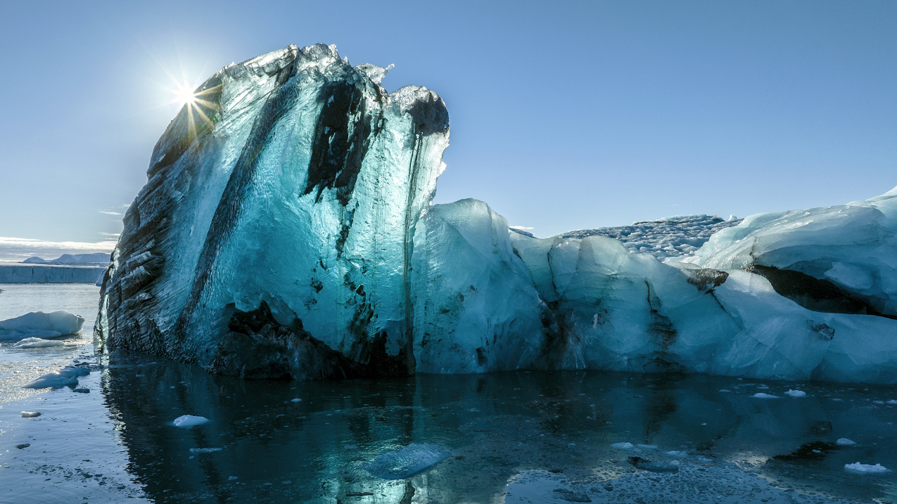 An iceberg in the waters of a fjord in Svalbard, Norway, during an expedition of the R/V Kinfish on July 7, 2022.