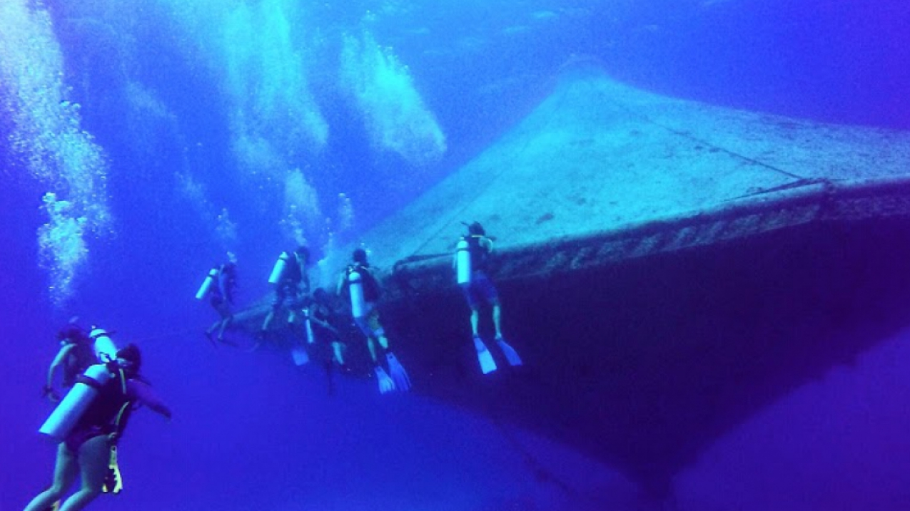 Divers around the open-ocean aquaculture cage at the Cape Eleuthera Institiute in The Bahamas. These cages are not currently used in the Gulf, but represent one type of farming technology that could work in in the region.