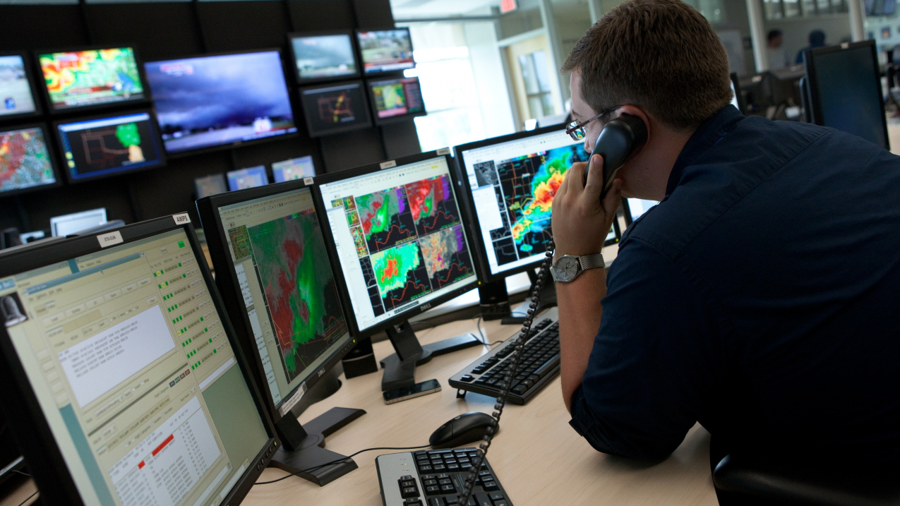 A National Weather Service meteorologist in Norman, Oklahoma, tracks a super cell tornado outbreak.