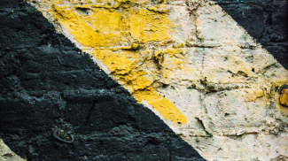 Stripes on a brick wall