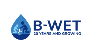 B-WET’s 20th Anniversary logo: It reads “B-WET 20 years and growing.” To the left of the text is a water drop shape and inside there a sketch of two people kneeling with a plant between them. 