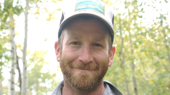 Jonathan smiles for the camera