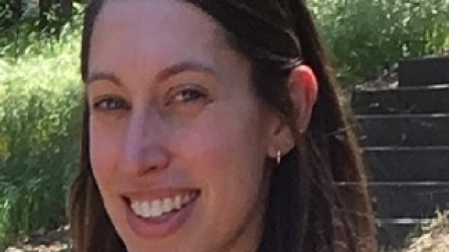 Lara poses in US Forest Service uniform