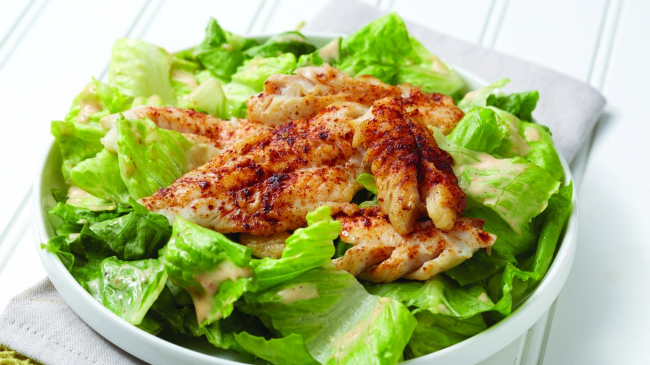 Alaska pollock Caesar salad. Photo courtesy of Alaska Seafood.