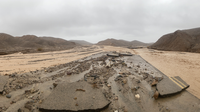 Photo of flood damage at Mud Canyon Road in Death Valley National Park, California, from August 2022. On August 5, 2022, the park received 1.70 inches of rain — an all-time 24-hour rainfall record for the area.