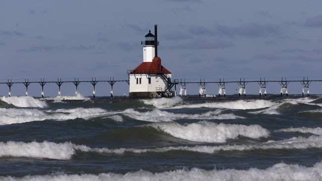 February 18, 2024: Waves roll toward the shore on Lake Michigan in St. Joseph, Michigan.The Great Lakes shorelines are historically ice covered this time of year. Persistent warmth resulted in a steady decrease in ice coverage across the Great Lakes this winter, which reached a historical low of 2.7% on February 11.