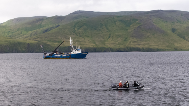 Photo showing two boats that were part of an expedition in Kiska, Alaska, to survey historic battlefields from World War II and document and honor the final resting place of U.S. and Japanese service members who lost their lives in the waters surrounding Kiska Island.