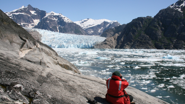 Photo showing NMML harbor seal researcher Dave Withrow conducts a seal count during a harbor seal pupping survey. (Image credit: Aleria Jensen/NOAA)