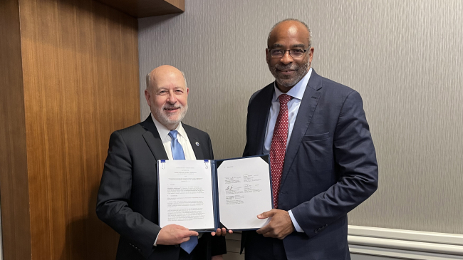 Photo of Dr. Rick Spinrad, NOAA administrator (left), and Dr. Everette Joseph, Director of the National Center for Atmospheric Research, hold up an expanded Memorandum of Understanding on December 10, 2024 in Washington DC. The MOU will strengthen the partnership between NOAA and NCAR to advance and accelerate our understanding and application of Earth system science.