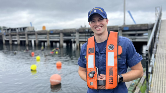 A U.S. Public Health Service Officer standing by the water during a NOAA diver training.