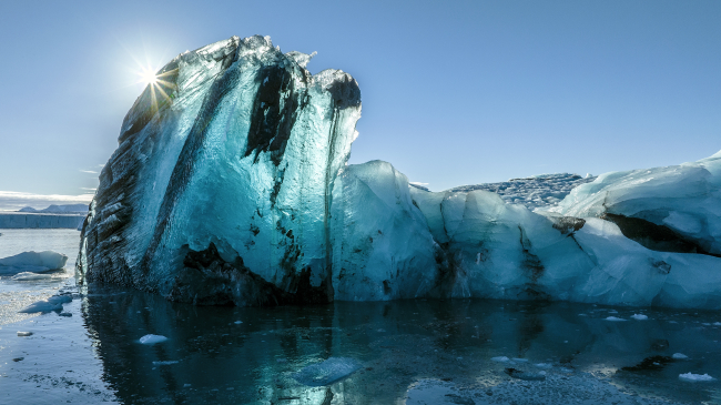 An iceberg in the waters of a fjord in Svalbard, Norway, during an expedition of the R/V Kinfish on July 7, 2022.