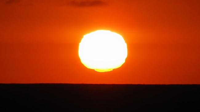 JULY 4, 2024: The sun sets over the Pacific Ocean. 2024 was the world’s warmest year in NOAA’s 175-year global climate record. Credit: Getty Images.