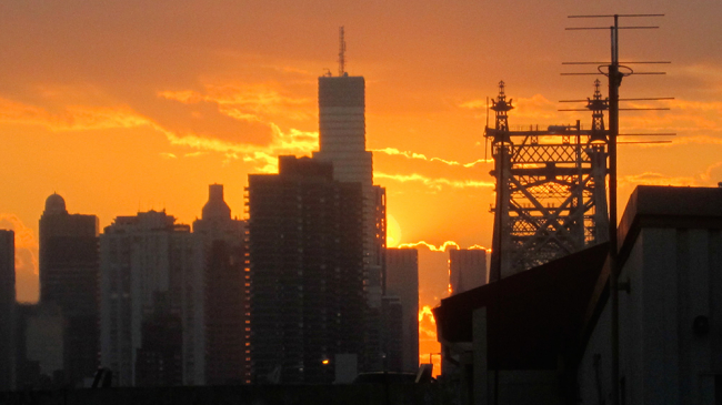 Summer sunset and the "Ed Koch"(Queensborough) Bridge in New York City as seen on June 6, 2011.