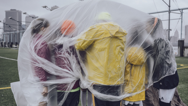 Rain caused this coach and his players to take a huddle under plastic sheeting during this soccer game in New York City in May. Spring 2017 was the 11th wettest spring on record, according to scientists from NOAA's National Centers for Environmental Information.
