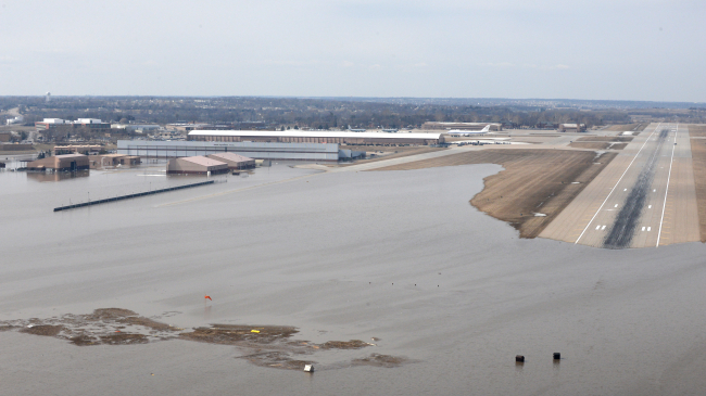 An aerial view of Offutt Air Force Base and the surrounding areas affected by flood waters March 17, 2019. An increase in water levels of surrounding rivers and waterways caused by record-setting snowfall over the winter in addition to a large drop in air pressure caused widespread flooding across the state of Nebraska. See more Air Force photos at https://www.afspc.af.mil.