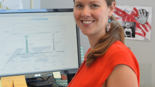 Assistant Professor Libby Barnes at her desk at Colorado State University. 