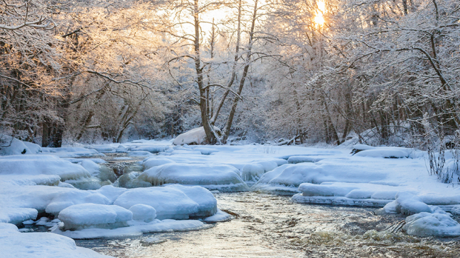 Flowing river in winter.