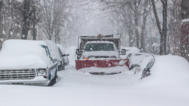 Snow plow at work in the streets of the District of Columbia  during the January 2016 blizzard.