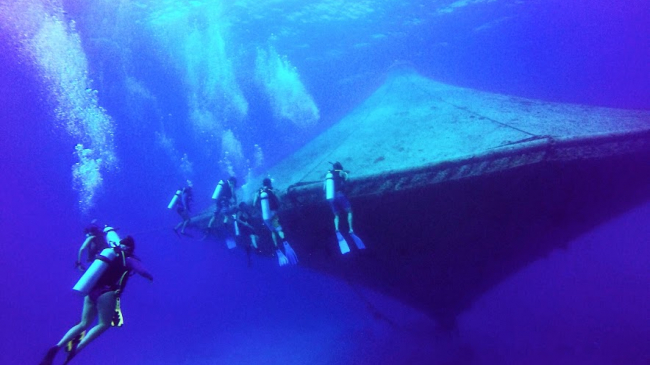 Divers around the open-ocean aquaculture cage at the Cape Eleuthera Institiute in The Bahamas. These cages are not currently used in the Gulf, but represent one type of farming technology that could work in in the region. 