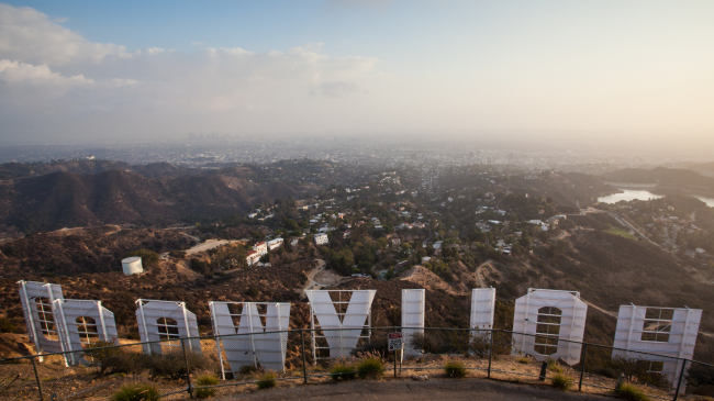 Emissions from volatile chemical products like perfumes, paints and other scented consumer items now rival vehicles as a pollution source in greater Los Angeles, according to a surprising new NOAA-led study. This photo shows smog over downtown Los Angeles from the perspective of behind the famed Hollywood sign.
