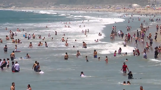 People on a beach. Cover for Health story map.