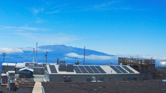 NOAA's Mauna Loa observatory is a premier research facility that has continuously monitored and collected atmospheric data since the 1950s. This photo, taken in 2019, shows the observatory on its perch at 11,000 feet elevation on Hawaii's tallest mountain, which enables sampling of "background" air that is free of local pollution. 