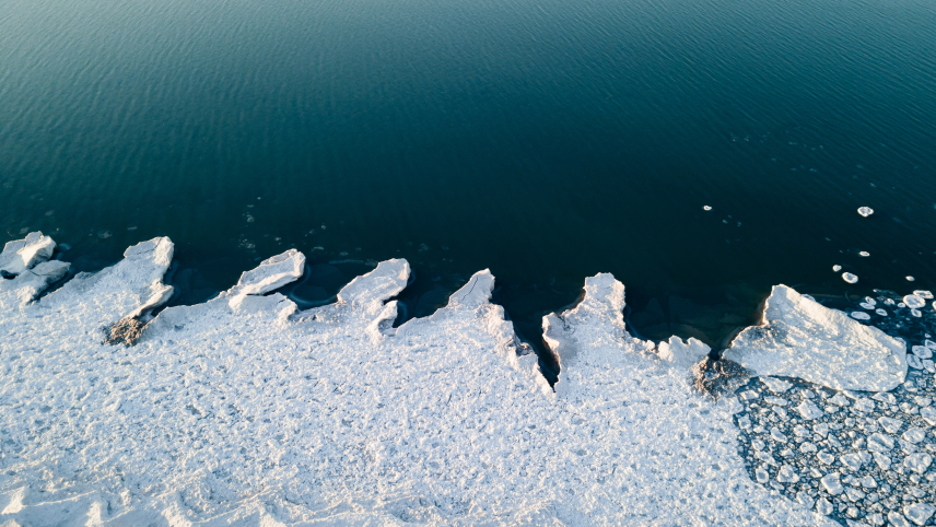 View of a lake and ice formations. 